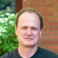 Headshot of Bruce Bowerman.