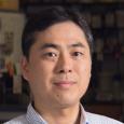Headshot of Ken-ichi Noma.