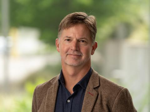 Headshot of Bill Cresko.