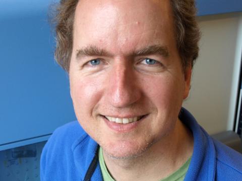 Headshot of Eric Johnson.