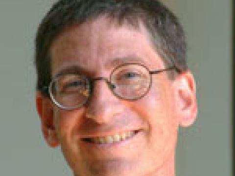 Headshot of Andrew Marcus.